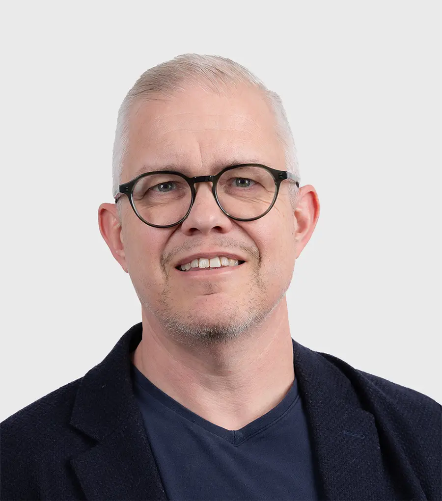 Jeffrey Van Vyve profile picture against light grey background.