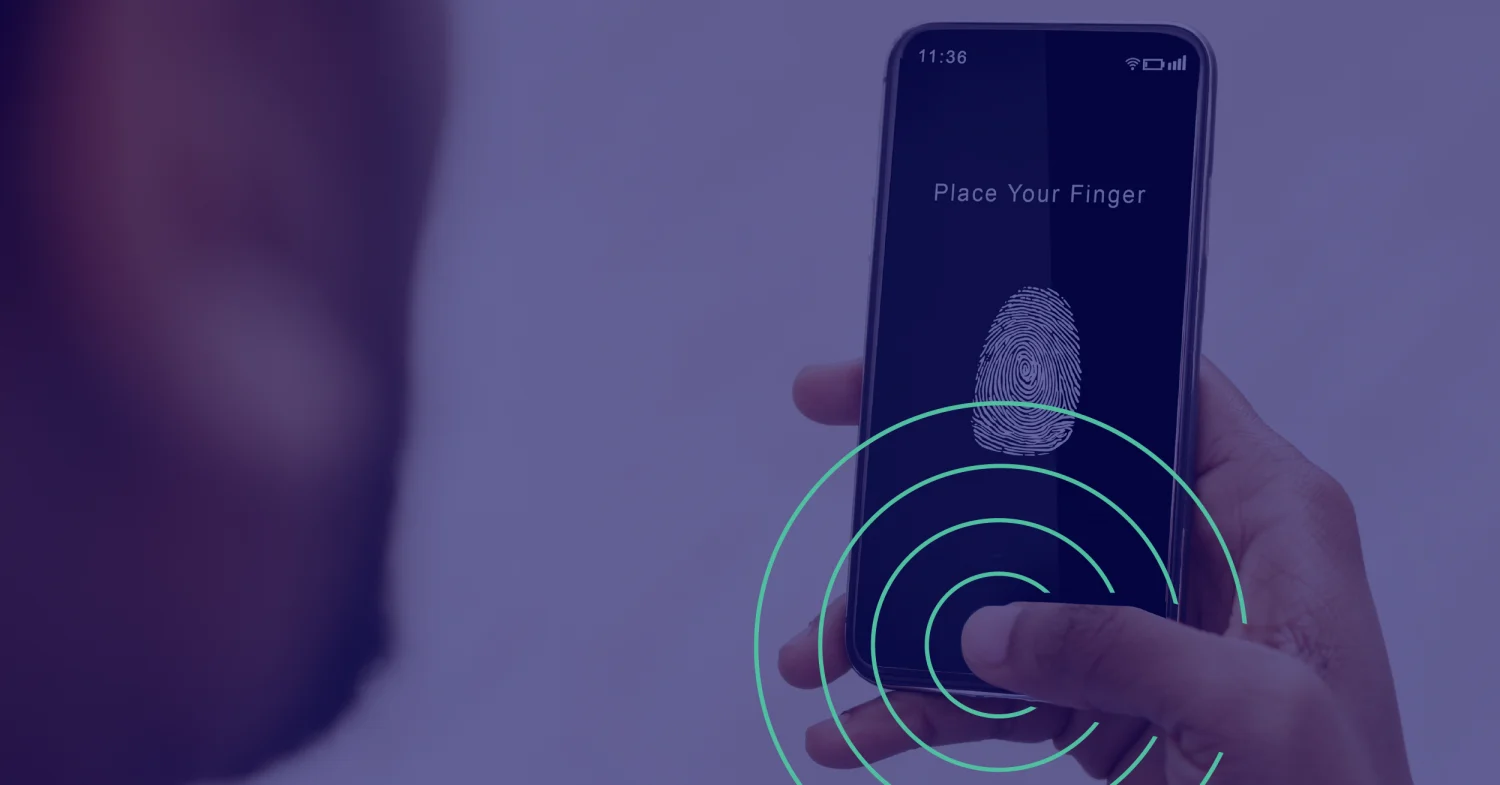 Image of someone holding a phone with an indetity check on teh screen.