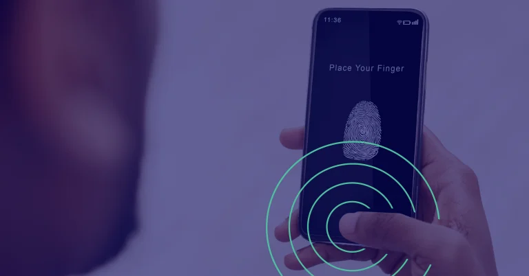 Image of someone holding a phone with an indetity check on teh screen.