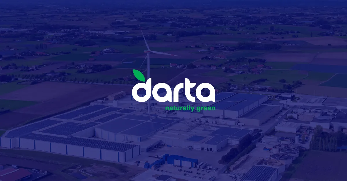 Reference case ACEN x Darta. The Darta logo in front of a picute of the Darta sie in Ardooie with a darkblue overlay.